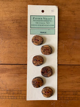 Load image into Gallery viewer, A card of six maple wood buttons.
