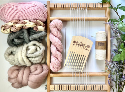 A handheld tapestry loom, tools and fibers