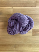 Load image into Gallery viewer, A skein of purple yarn called Violet.
