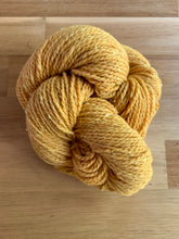 Load image into Gallery viewer, A skein of yellow yarn called Yarrow.
