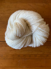 Load image into Gallery viewer, A skein of white Romney yarn
