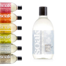 Load image into Gallery viewer, A 12 oz bottle of Soak, scentless. The other scents are shown to the left.
