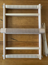 Load image into Gallery viewer, A small wood tapestry loom with heddle bar and two shuttle sticks.
