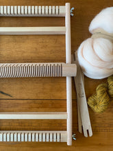 Load image into Gallery viewer, A small wood tapestry loom with heddle bar and two shuttle sticks.
